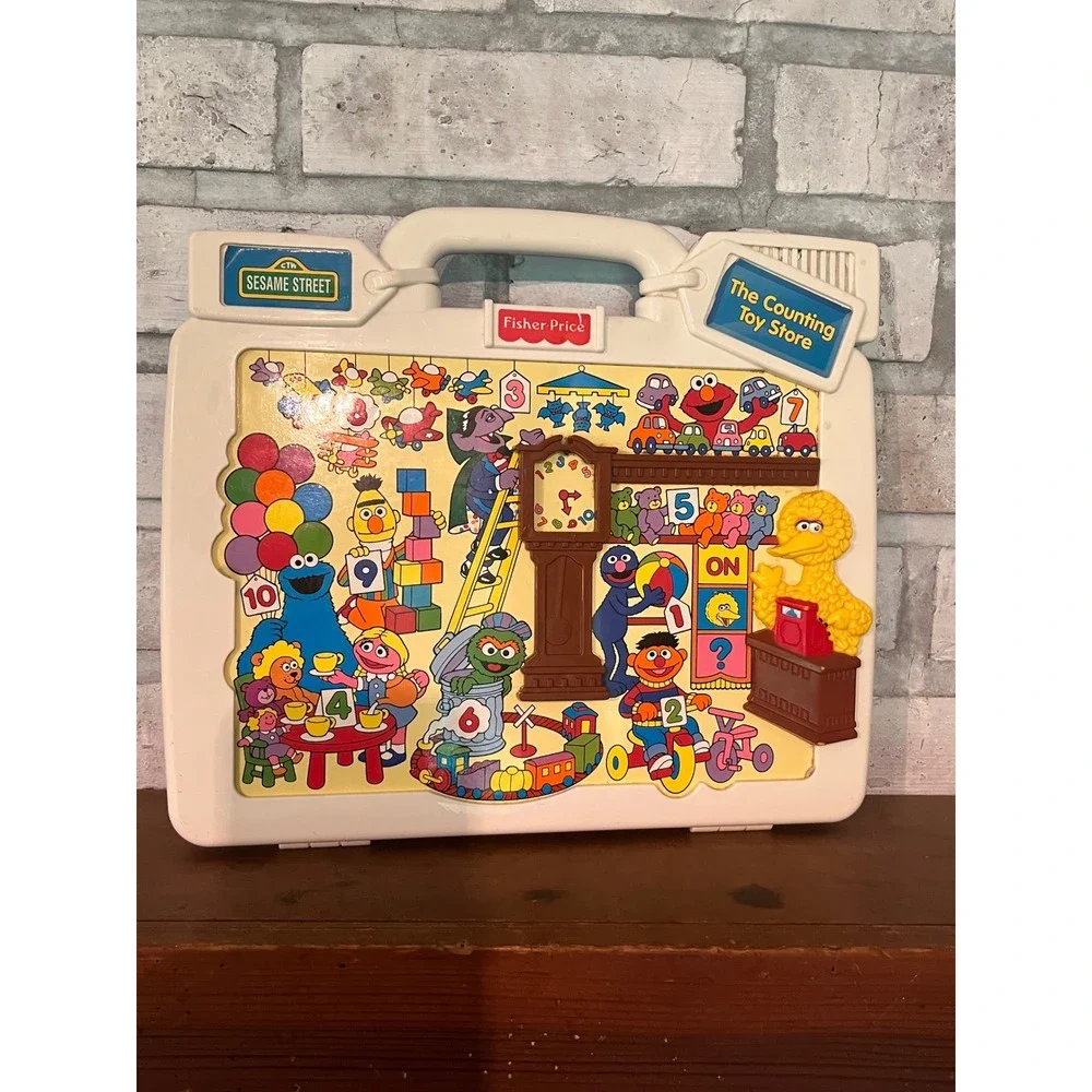 Vintage Fisher-Price Talk'n Teach Tag Along Sesame Street The Counting Toy Store